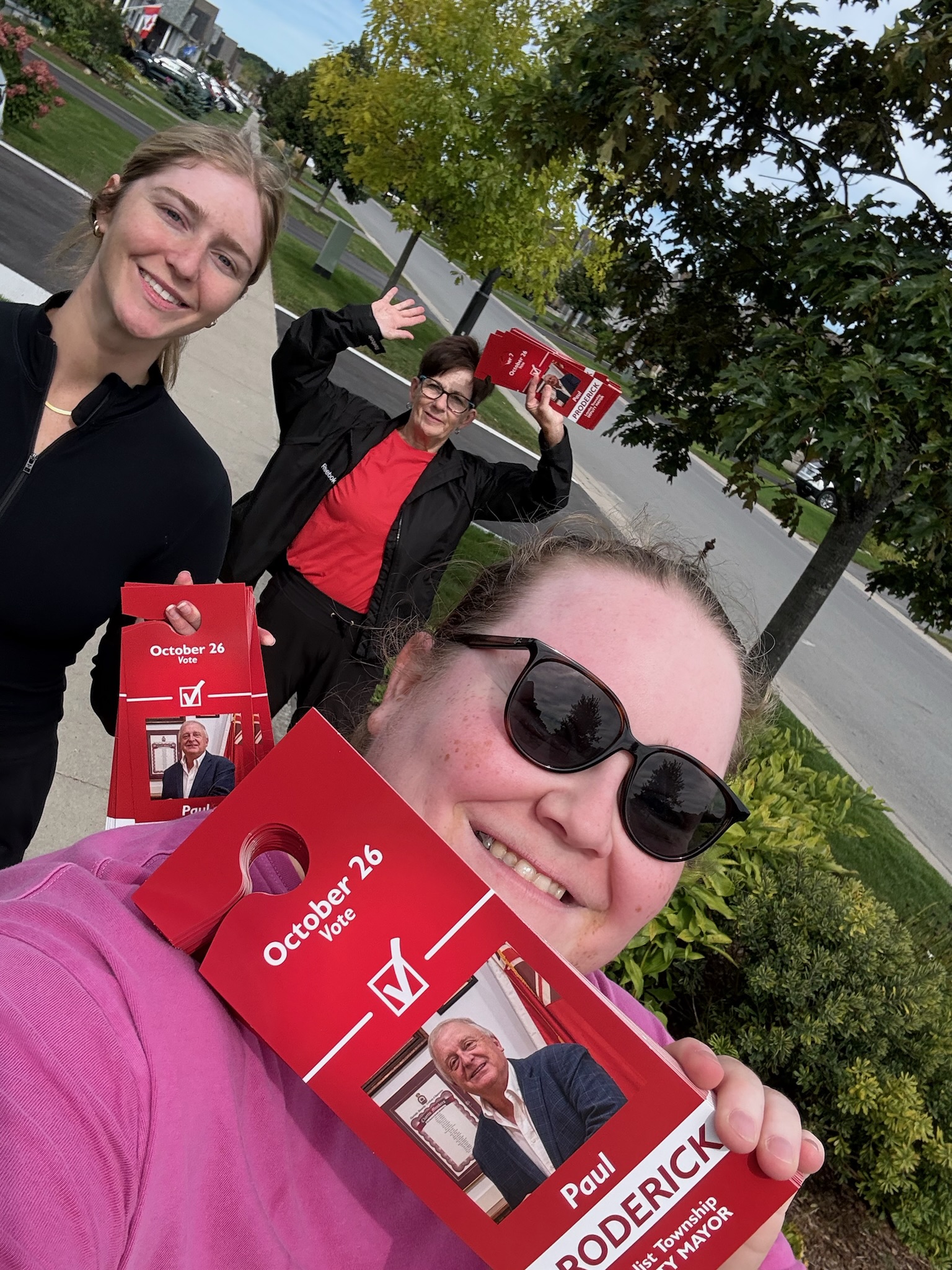 Paul and volunteers delivering campaign flyers door to door