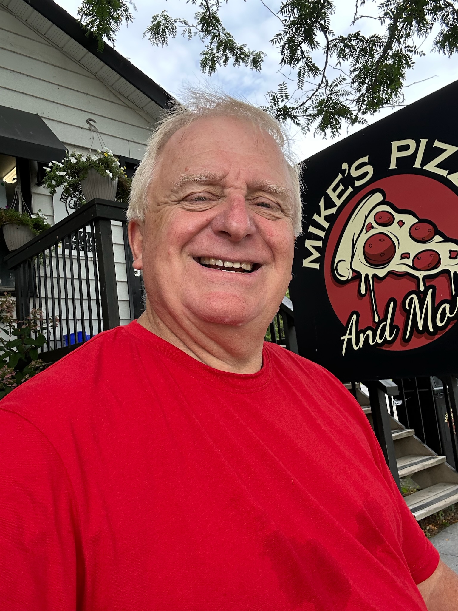 Paul visiting Mike's Pizza, a local Loyalist Township business